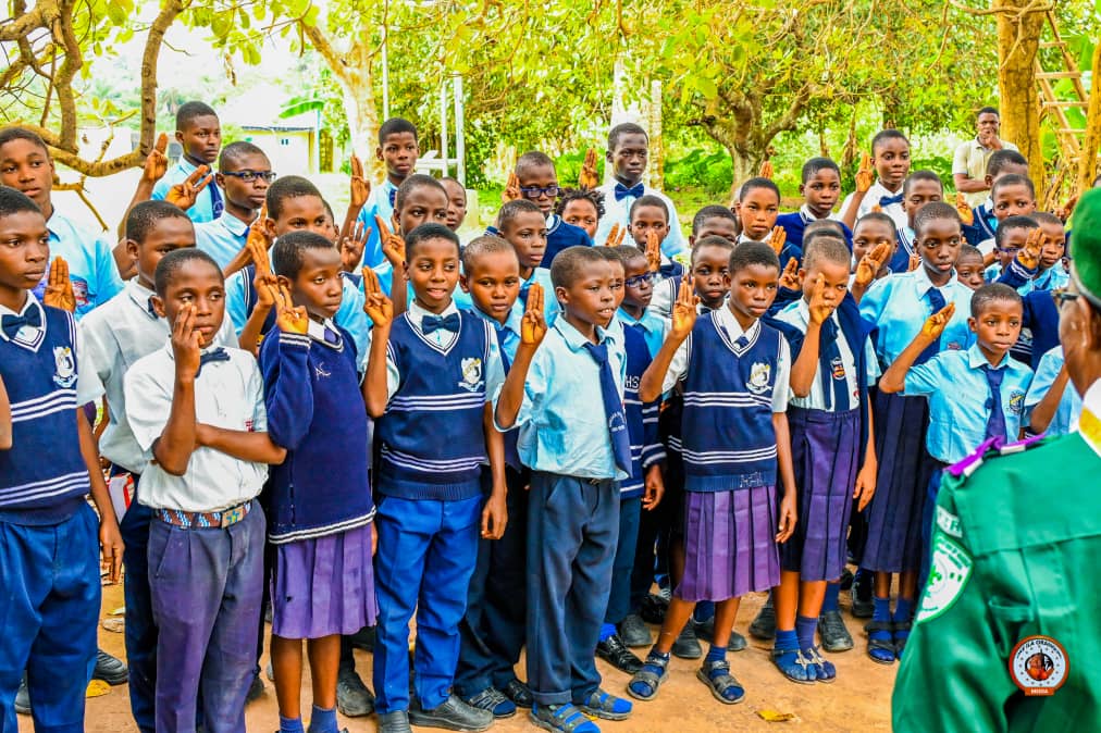 Students of Abolarin College working the school farm